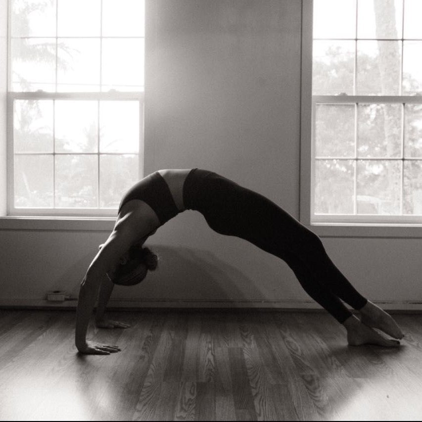 A yoga pose held in the loft studio